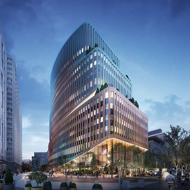 A modern, glass-clad office building with curved edges and multiple floors is illuminated at dusk. People walk around the bustling plaza at its base, surrounded by trees and neighboring tall structures.
