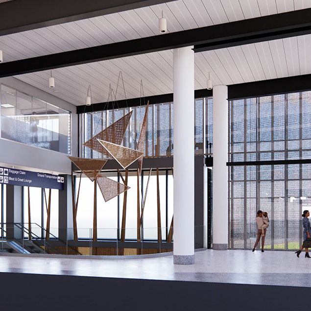 A modern, spacious transit station interior with large windows, white columns, and geometric hanging artwork. Two people stand near the windows, and signage for escalators and lounges is visible.