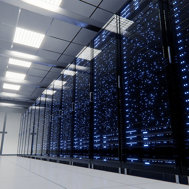 A row of sleek, glass-fronted server racks filled with blue and white LED lights lines a clean, modern data center with bright overhead lighting and reflective tiled floors.