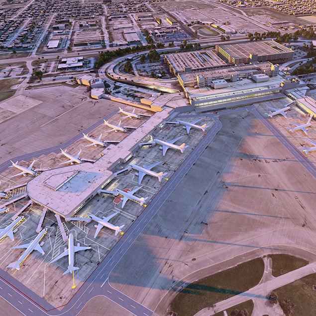 Aerial view of an airport terminal with several airplanes parked at gates. Surrounding the terminal are taxiways, parking lots, roads, and nearby residential neighborhoods. The scene is bathed in early morning or late afternoon light.