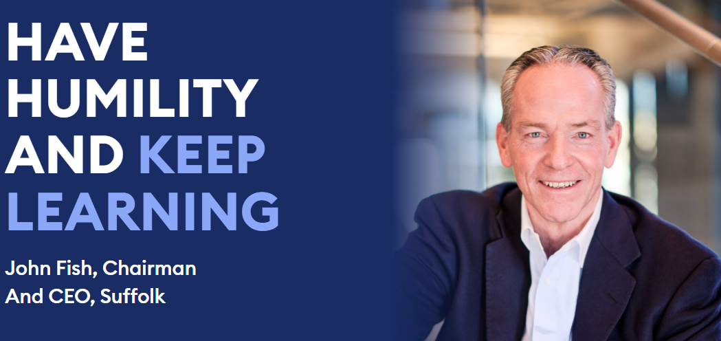 A man in a suit smiles while sitting indoors. Beside him, bold text reads: Have humility and keep learning. John Fish, Chairman and CEO, Suffolk.